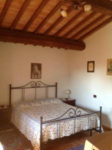Ένα ή περισσότερα κρεβάτια σε δωμάτιο στο Agriturismo La Collina