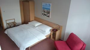 Posteľ alebo postele v izbe v ubytovaní Hotel Iberia