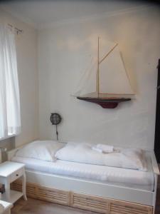 Ein Bett oder Betten in einem Zimmer der Unterkunft St. Pauli Lodge