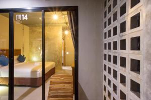 Postel nebo postele na pokoji v ubytování Light Khao Lak Resort