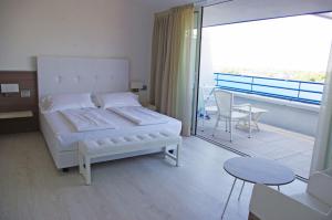 Postel nebo postele na pokoji v ubytování Grand Hotel Esplanada