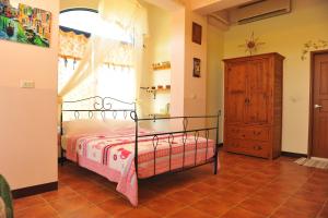 Postel nebo postele na pokoji v ubytování Tuscany Garden B&B