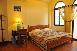 Postel nebo postele na pokoji v ubytování Tuscany Garden B&B