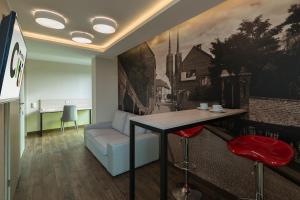 TV a/nebo společenská místnost v ubytování Citi Hotel's Wrocław