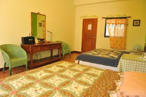 Postel nebo postele na pokoji v ubytování Tuscany Garden B&B