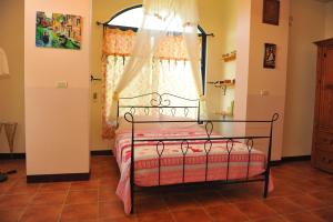 Postel nebo postele na pokoji v ubytování Tuscany Garden B&B