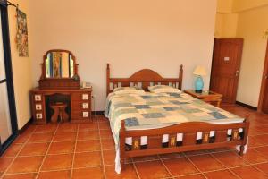 Postel nebo postele na pokoji v ubytování Tuscany Garden B&B