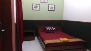 Letto o letti in una camera di ADA Homestay