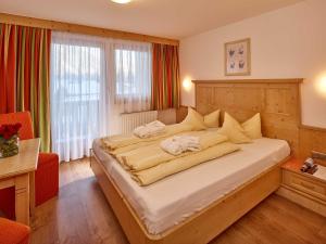 En eller flere senge i et værelse på Hotel Zum Hirschen