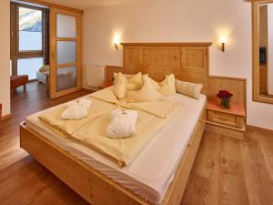 Letto o letti in una camera di Hotel Zum Hirschen