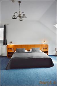 Postel nebo postele na pokoji v ubytování Penzion Starý dvůr