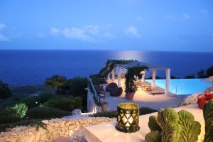 Bazén v ubytování Le Capase Resort Salento nebo v jeho okolí