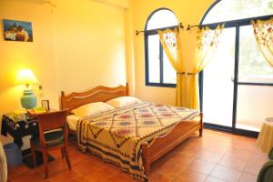 Postel nebo postele na pokoji v ubytování Tuscany Garden B&B