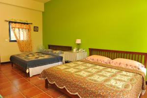 Postel nebo postele na pokoji v ubytování Tuscany Garden B&B