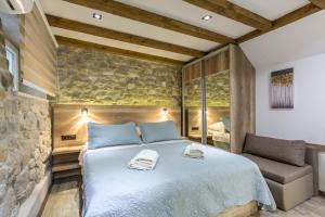 Posteľ alebo postele v izbe v ubytovaní Reval Luxury Stone house apartments****