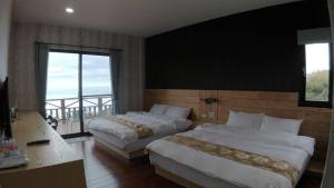 Katil atau katil-katil dalam bilik di Shi Home 1639