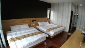 Katil atau katil-katil dalam bilik di Shi Home 1639