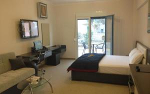 Posteľ alebo postele v izbe v ubytovaní Pearl Bay Hotel Apartments
