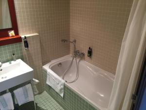 Ванная комната в Hotel du Casino