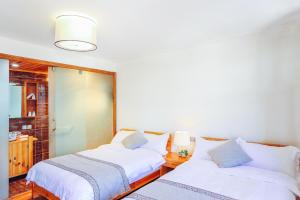Postel nebo postele na pokoji v ubytování Log Cabin
