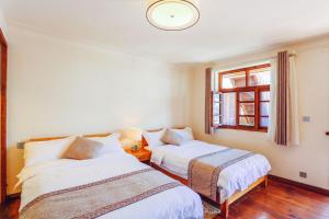 Postel nebo postele na pokoji v ubytování Log Cabin