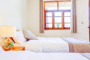 Postel nebo postele na pokoji v ubytování Log Cabin