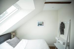 Postel nebo postele na pokoji v ubytování LOFT-ATELIER