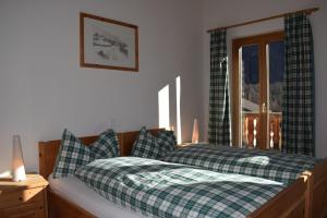 Voodi või voodid majutusasutuse Residence Miragolf toas