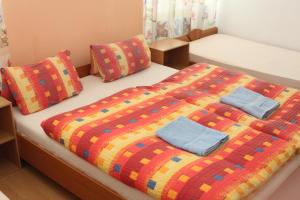 Posteľ alebo postele v izbe v ubytovaní Pension Motel Anna
