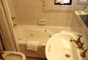 Koupelna v ubytování Primacy Apart Hotel