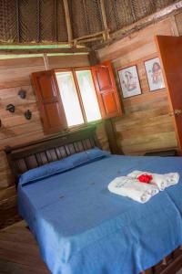 Cama o camas de una habitación en Posadas Ecoturisticas Seineken