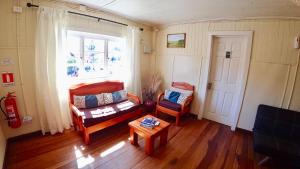 Posezení v ubytování Hostal Triwe