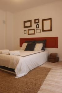a bedroom with a large bed in a room at Nooks Sintra three in Sintra