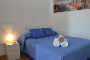 Posteľ alebo postele v izbe v ubytovaní Apartamento Vacacional con vistas al mar
