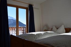 Voodi või voodid majutusasutuse Residence Miragolf toas