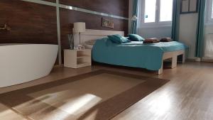 Posteľ alebo postele v izbe v ubytovaní Liszt Studio Holiday Home