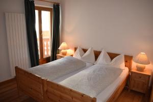 Voodi või voodid majutusasutuse Residence Miragolf toas
