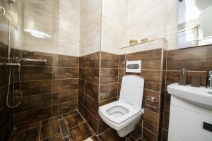 Kylpyhuone majoituspaikassa Apartman Top Spot