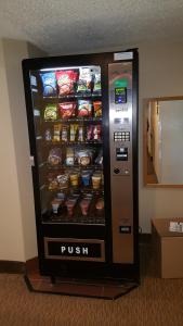 a vending machine filled with different types of food at Baymont by Wyndham Barstow Historic Route 66 in Barstow