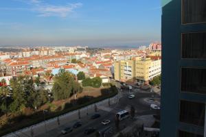 Nespecifikovaný výhled na destinaci Sacavém nebo výhled na město při pohledu z apartmánu