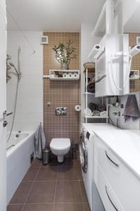 Bilik mandi di New Gallery Best West Apartment 101