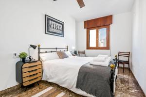 Posteľ alebo postele v izbe v ubytovaní Mary Apartment in Malaga by Solaga Holiday Homes