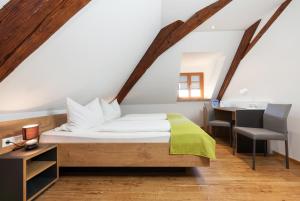 Postel nebo postele na pokoji v ubytování Torstuben