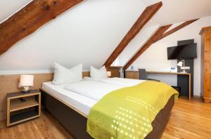 Postel nebo postele na pokoji v ubytování Torstuben