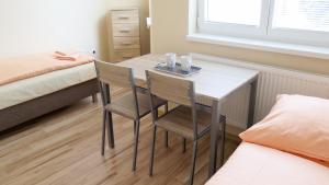 Posteľ alebo postele v izbe v ubytovaní Apartmány ORAVA-EDDA