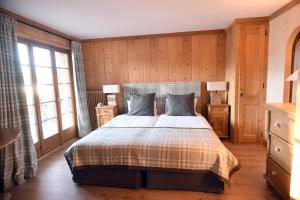Cama o camas de una habitación en Chalet d'Adrien