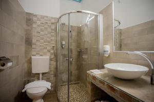 Koupelna v ubytování Hotel Carpe Diem
