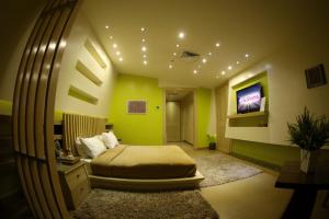 TV a/nebo společenská místnost v ubytování Layali Al Shams Hotel