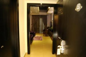 Postel nebo postele na pokoji v ubytování Layali Al Shams Hotel
