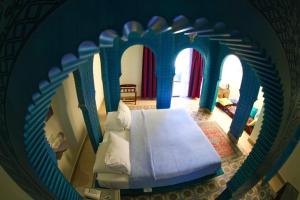 Postel nebo postele na pokoji v ubytování Layali Al Shams Hotel